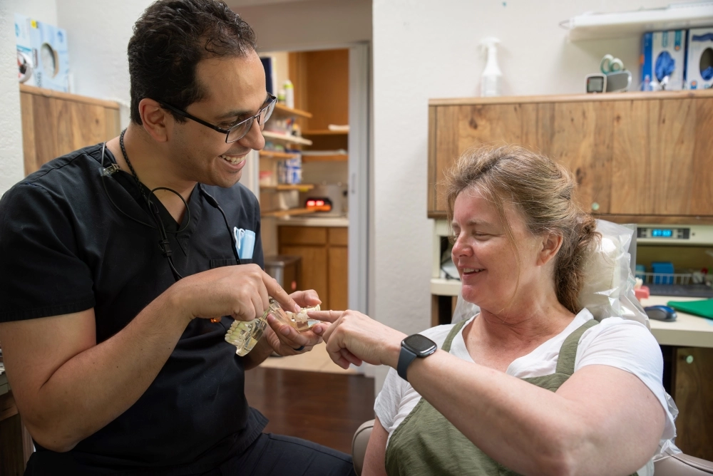 Dentist talking to the patient